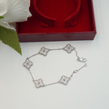 Silver pavé clover bracelet with five crystal-set motifs